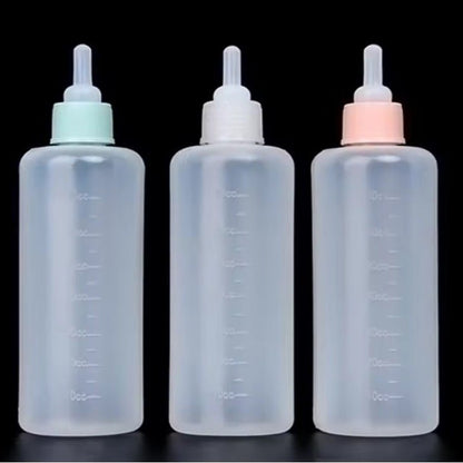 Biberon pour chatons couleurs differentes
